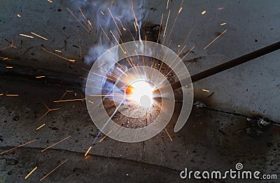 SMAW â€“ Shielded metal arc welding and welding fumes. Stock Photo